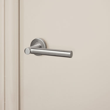 Grosetto deurklink RVS met rond rozet