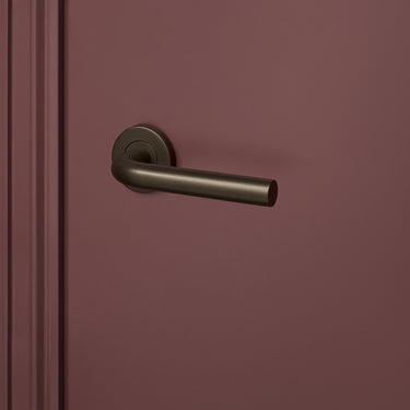 Oristano deurklink brons met rond rozet