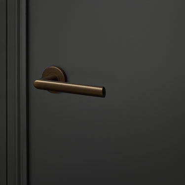 Ragusa deurklink brons met rond rozet